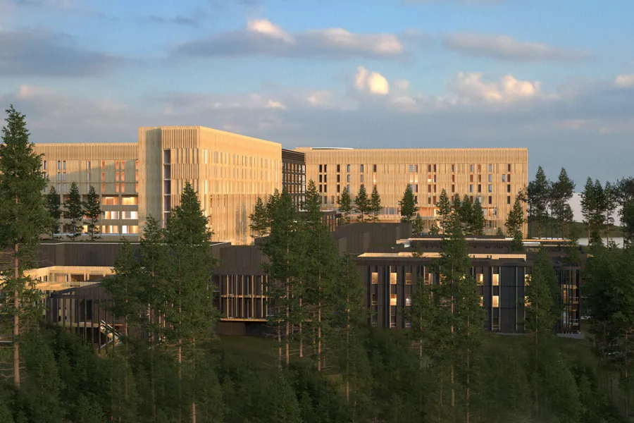 Skisse av sykehusbygg i landskap med trær rundt