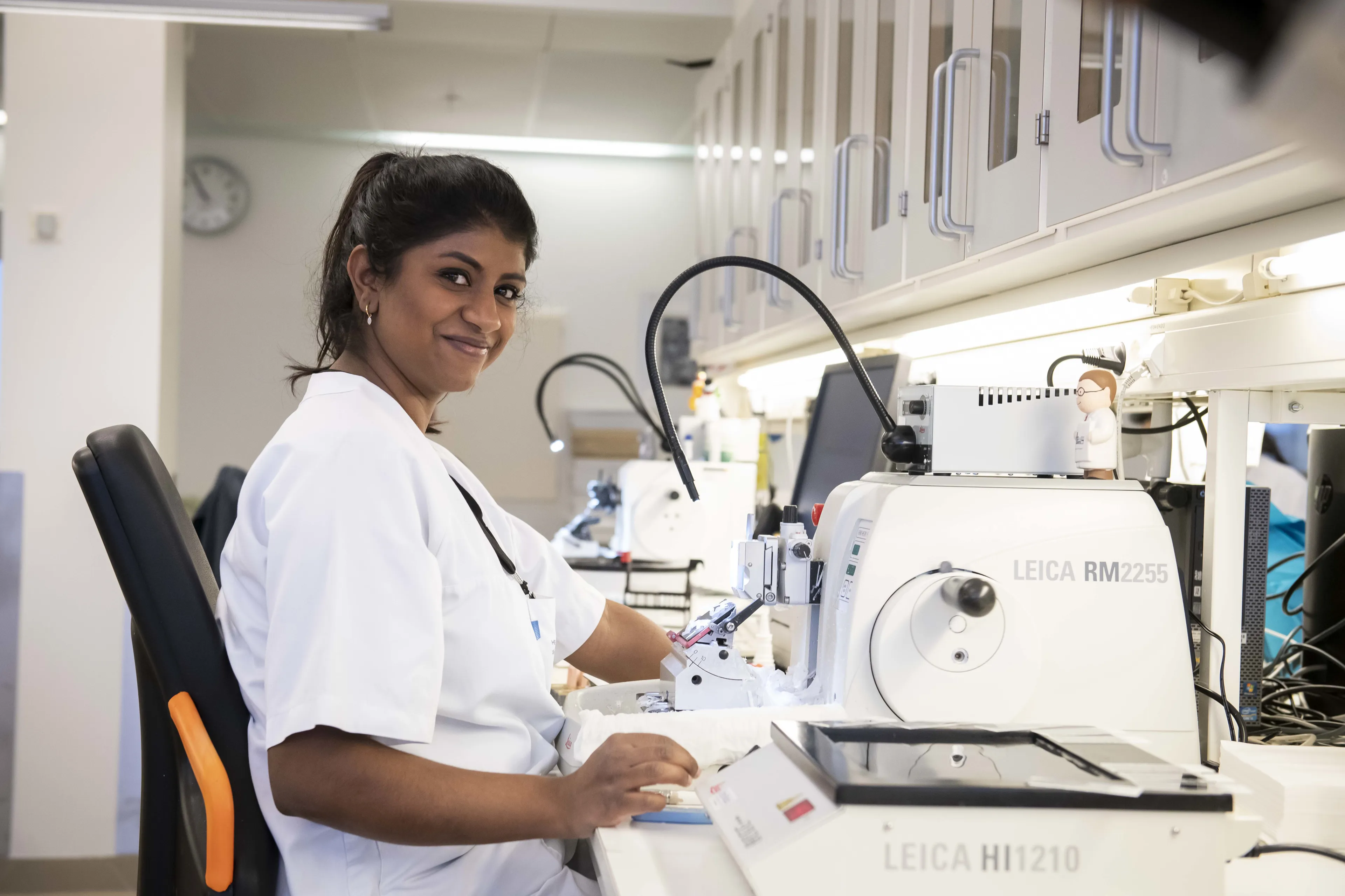 A man in a white coat